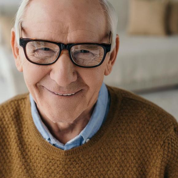 Mobile opticians in Norfolk and Norwich. Glasses on a senior man.